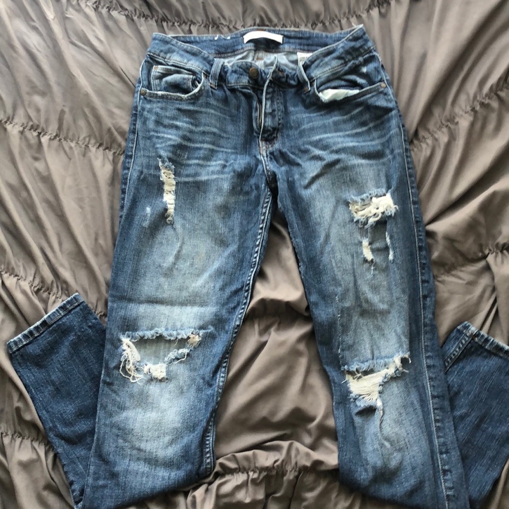 Ripped blue jeans